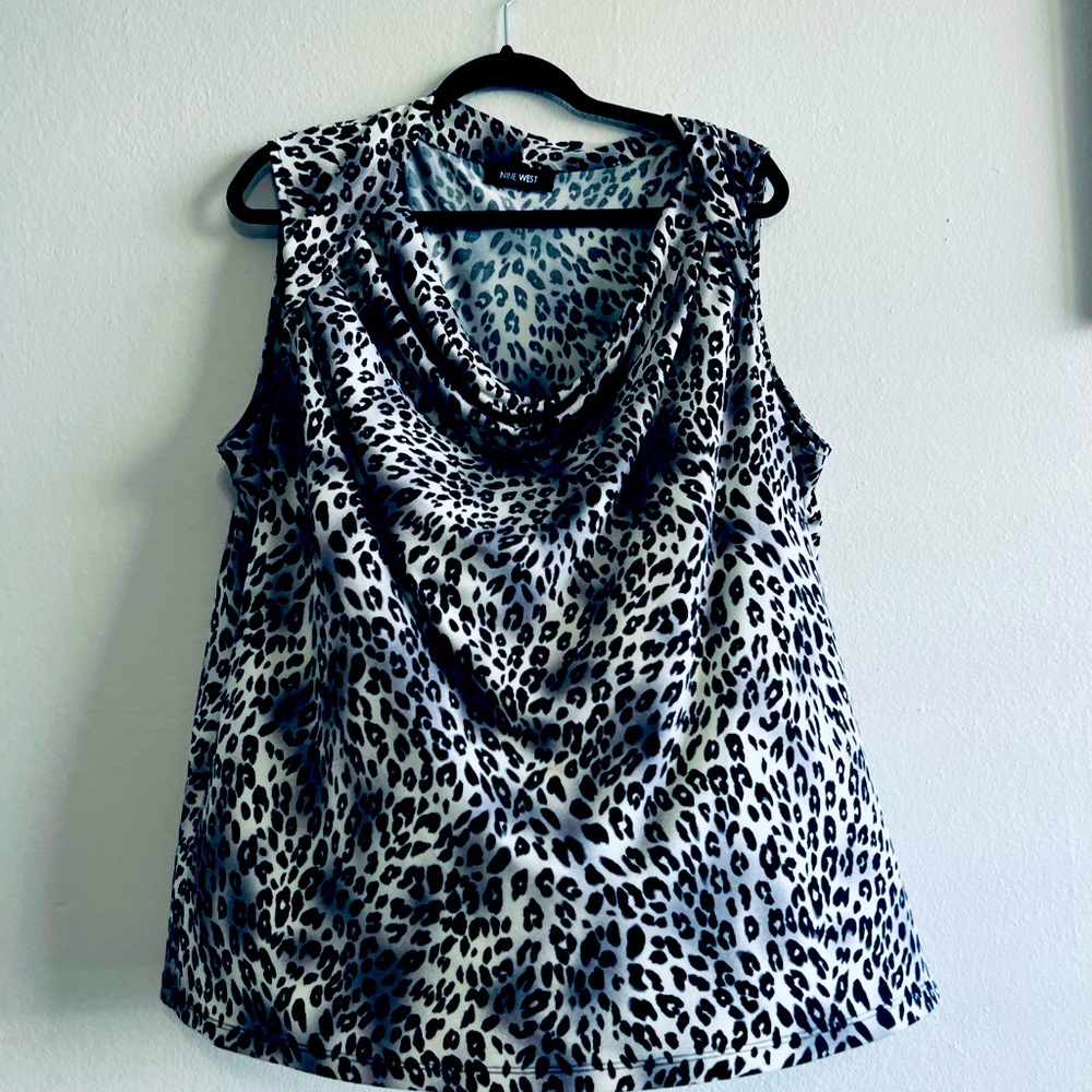 Animal print blouse for businesses and casual look.